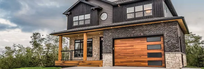 Textro Door Company technician completing garage door repair